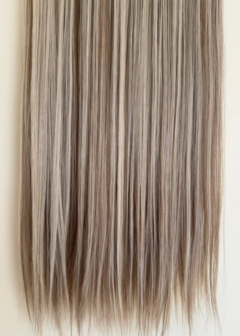 Blonde hair extensions with a gradient on a beige background